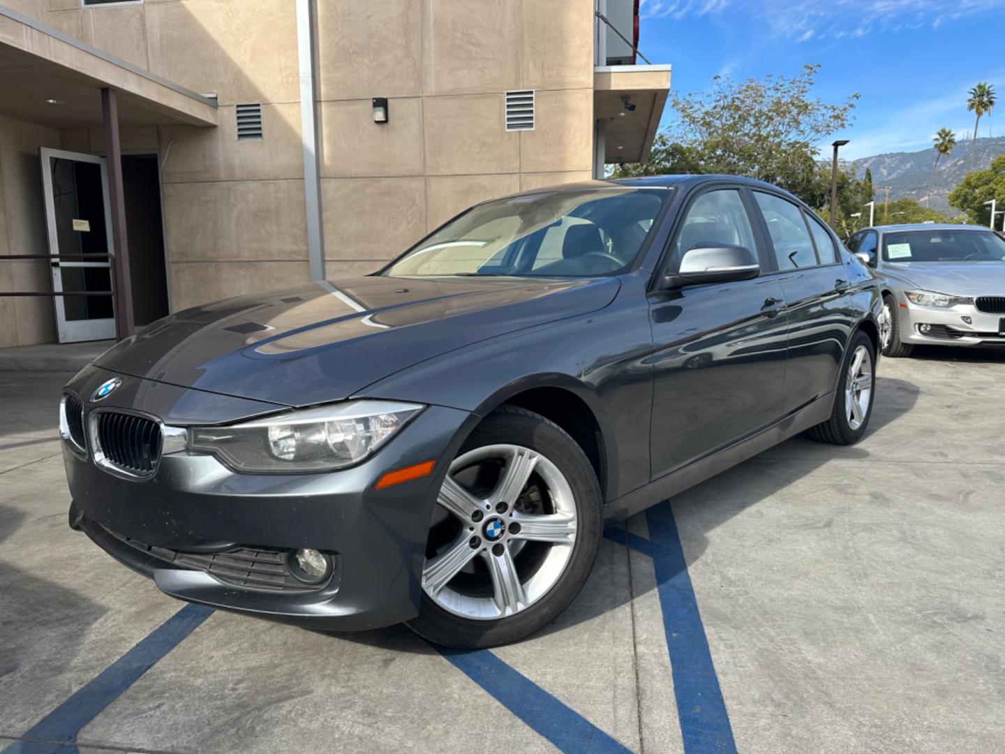 2014 Gray /Black BMW 3-Series 320i xDrive (WBA3C3C57EP) with an 2.0L L4 DOHC 16V engine, Automatic transmission, located at 30 S. Berkeley Avenue, Pasadena, CA, 91107, (626) 248-7567, 34.145447, -118.109398 - Navigation! Back-up camera! 2014 BMW 3-Series 320i xDrive - The Ideal Choice in Pasadena, CA Looking for top-tier BHPH cars in Pasadena, CA? Look no further than the 2014 BMW 3-Series 320i xDrive. As a reputable BHPH dealer in Los Angeles, CA, we take pride in offering some of the finest pre-own - Photo#0